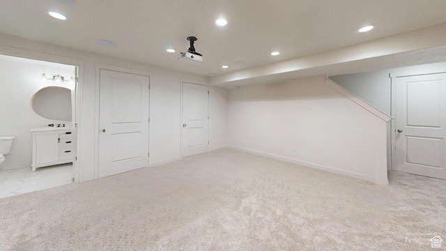 14952 S Messi St, Herriman, UT 84096 - finished below grade area featuring baseboards, recessed lighting, and carpet