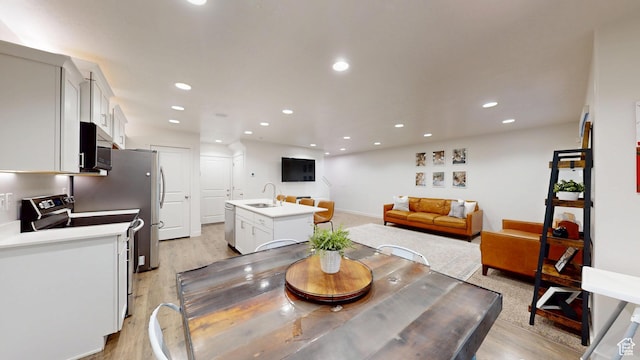 14952 S Messi St, Herriman, UT 84096 - dining space featuring recessed lighting and light wood-type flooring