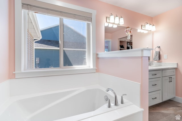 437 N 800 E, Hyde Park, UT 84318 - full bathroom featuring a bath, vanity, and plenty of natural light