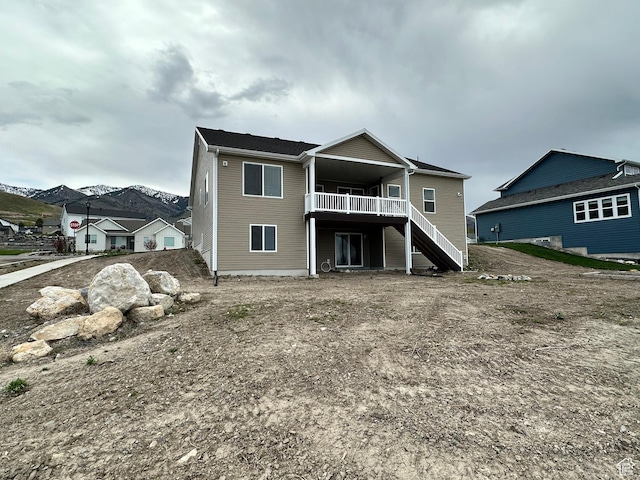 437 N 800 E, Hyde Park, UT 84318 - rear view of house featuring a wooden deck and stairs