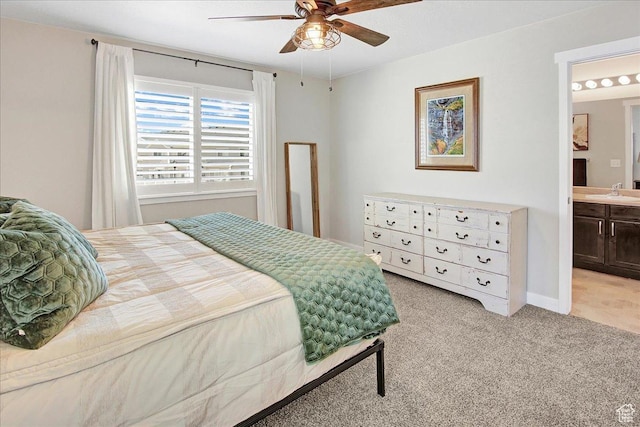 5197 W Copeland Dr S, Herriman, UT 84096 - bedroom with a sink, ensuite bathroom, baseboards, light colored carpet, and ceiling fan