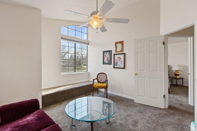 846 E Holroyd S, South Ogden, UT 84403 - living area featuring carpet floors, baseboards, ceiling fan, and a towering ceiling