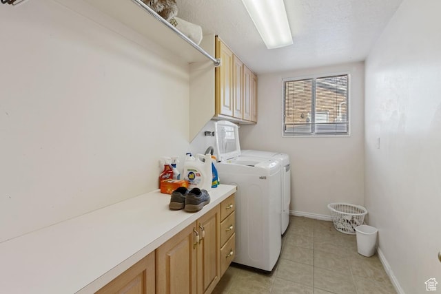 846 E Holroyd S, South Ogden, UT 84403 - washroom with a textured ceiling, baseboards, cabinet space, separate washer and dryer, and light tile patterned floors