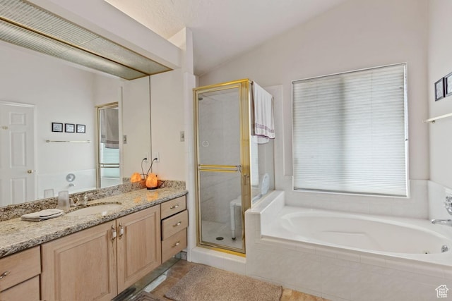 846 E Holroyd S, South Ogden, UT 84403 - full bath with a bath, lofted ceiling, a stall shower, and vanity