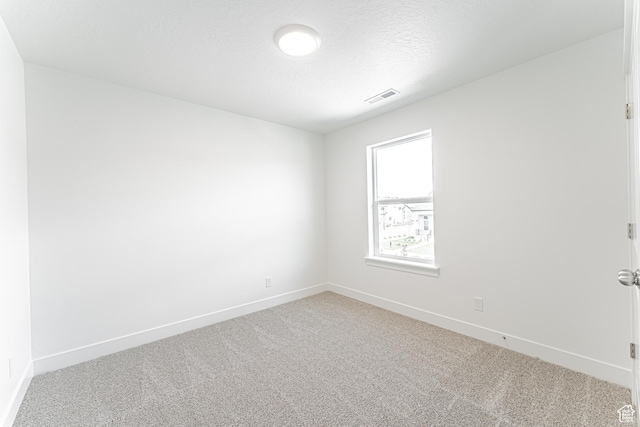 3671 W 950 N Unit 218, Lehi, UT 84043 - empty room featuring light carpet and baseboards
