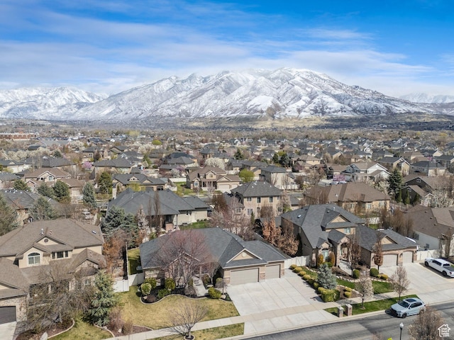 aerial view featuring a mountain view and a residential view