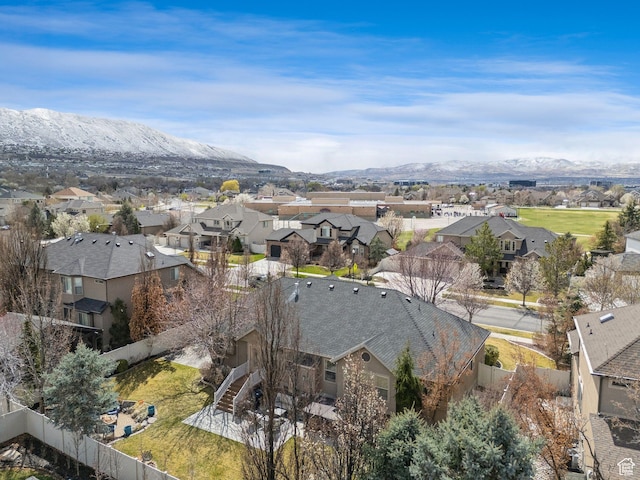 drone / aerial view with a mountain view and a residential view