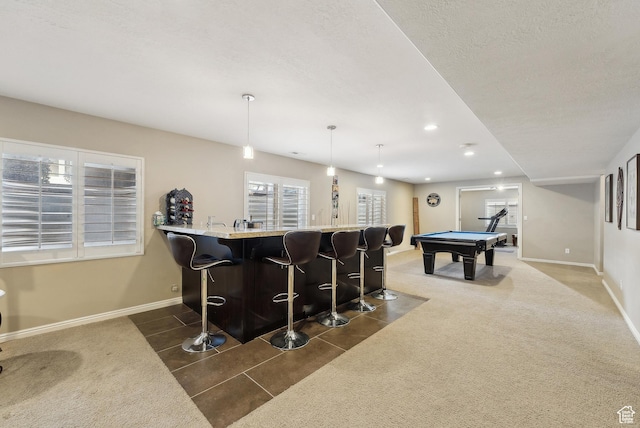 interior space with baseboards, billiards, recessed lighting, dark carpet, and hanging light fixtures