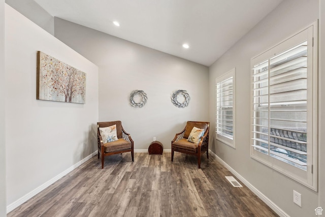 sitting room featuring wood finished floors, baseboards, visible vents, and recessed lighting