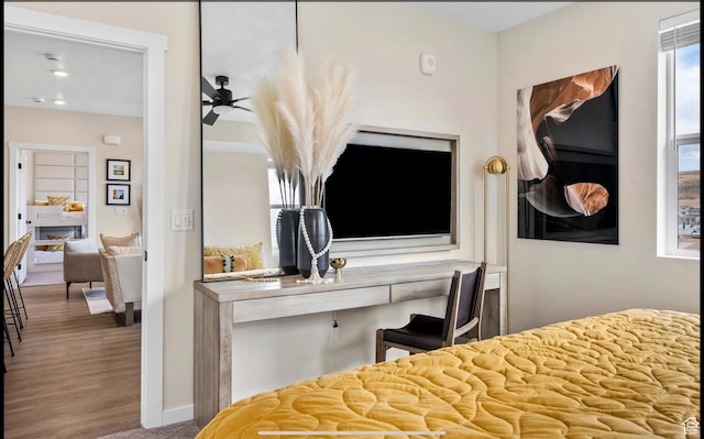 875 W Akoya Pearl St Unit 303, St George, UT 84790 - bedroom with baseboards and wood finished floors