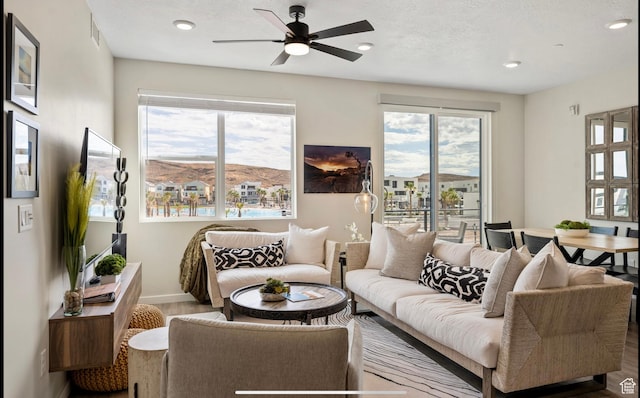 875 W Akoya Pearl St Unit 303, St George, UT 84790 - living room featuring a wealth of natural light, wood finished floors, recessed lighting, and a ceiling fan
