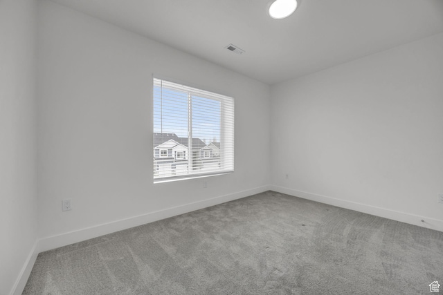 864 N Gleneagles Ct W, Tooele, UT 84074 - empty room with baseboards, carpet floors, and visible vents