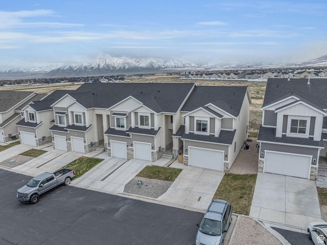 864 N Gleneagles Ct W, Tooele, UT 84074 - view of front facade with a residential view, an attached garage, and stone siding
