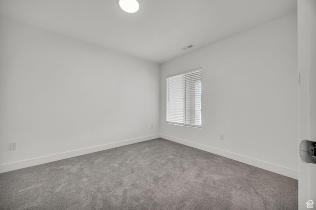 864 N Gleneagles Ct W, Tooele, UT 84074 - carpeted spare room featuring baseboards and visible vents