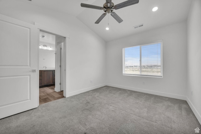 864 N Gleneagles Ct W, Tooele, UT 84074 - empty room with carpet flooring, lofted ceiling, baseboards, visible vents, and ceiling fan