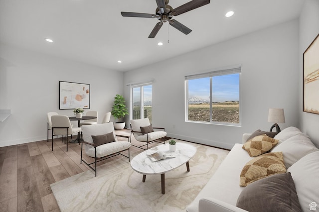 864 N Gleneagles Ct W, Tooele, UT 84074 - living room featuring wood finished floors, recessed lighting, and ceiling fan