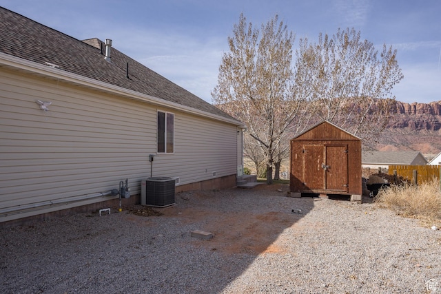 98 E Mt Peale Dr, Moab, UT 84532 - exterior space featuring an outbuilding, a storage unit, and central AC unit