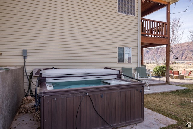 98 E Mt Peale Dr, Moab, UT 84532 - view of patio with a wooden deck and a hot tub