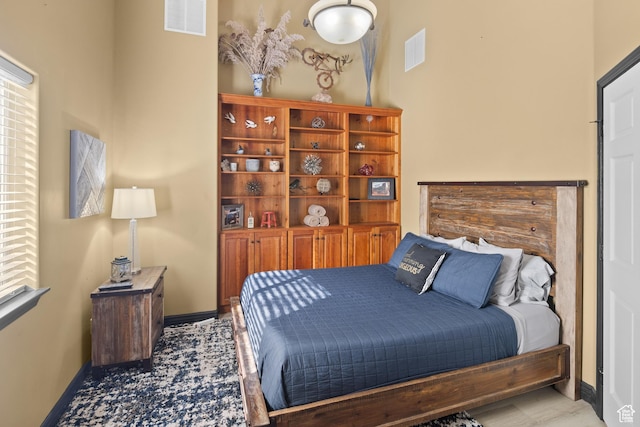 98 E Mt Peale Dr, Moab, UT 84532 - bedroom featuring baseboards and visible vents