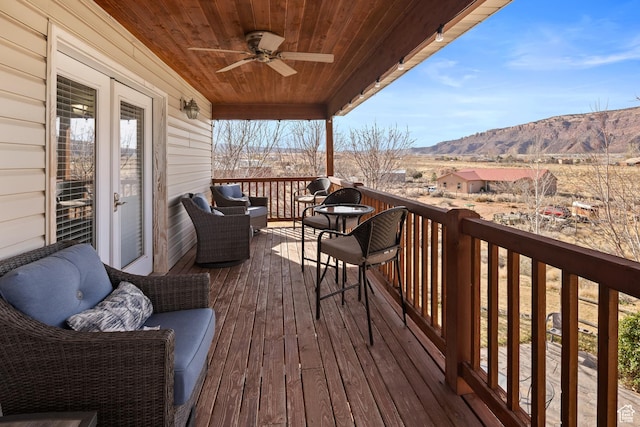 98 E Mt Peale Dr, Moab, UT 84532 - wooden terrace featuring a mountain view and ceiling fan