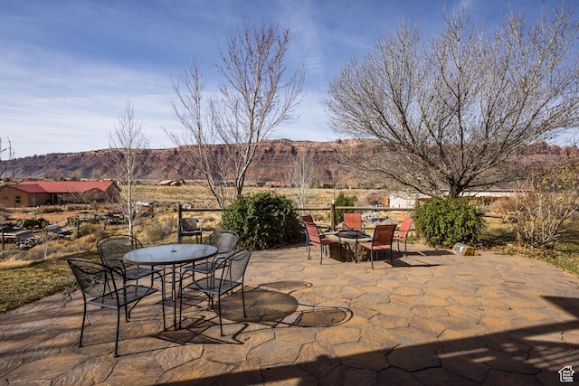 98 E Mt Peale Dr, Moab, UT 84532 - view of patio / terrace with a mountain view and outdoor dining space