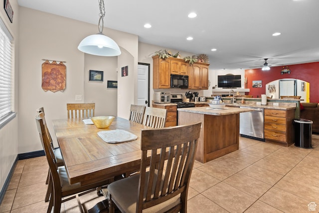 98 E Mt Peale Dr, Moab, UT 84532 - dining room featuring baseboards, a ceiling fan, recessed lighting, and light tile patterned floors