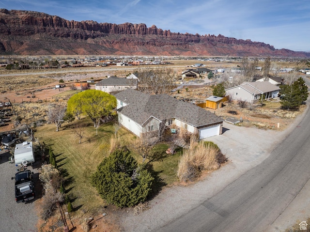 98 E Mt Peale Dr, Moab, UT 84532 - drone / aerial view featuring a mountain view