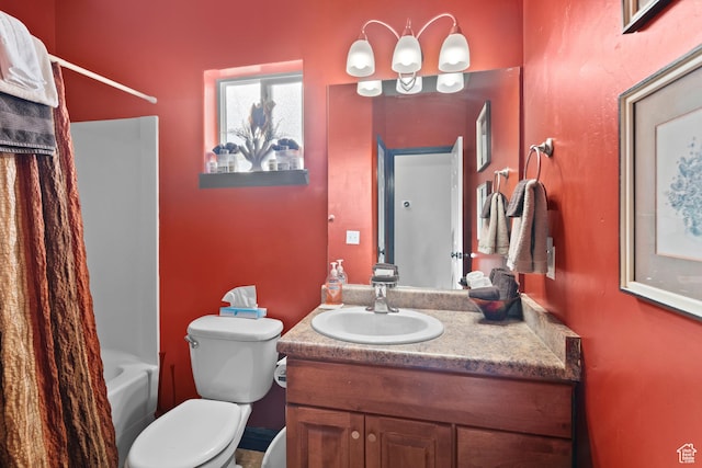 98 E Mt Peale Dr, Moab, UT 84532 - bathroom featuring shower / tub combo with curtain, toilet, and vanity