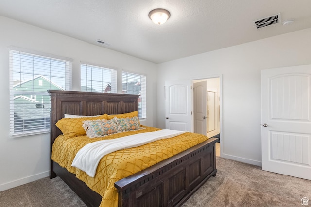 6321 W Moon Valley Dr, South Jordan, UT 84009 - bedroom featuring light colored carpet, baseboards, and visible vents