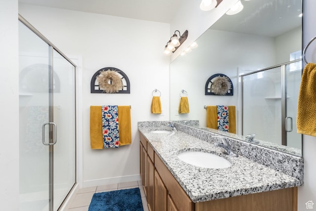 6321 W Moon Valley Dr, South Jordan, UT 84009 - full bathroom with tile patterned floors, a sink, and a stall shower