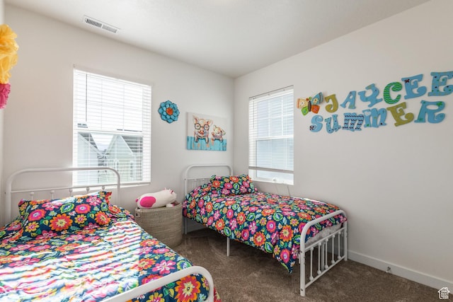 6321 W Moon Valley Dr, South Jordan, UT 84009 - bedroom featuring visible vents, baseboards, and carpet floors