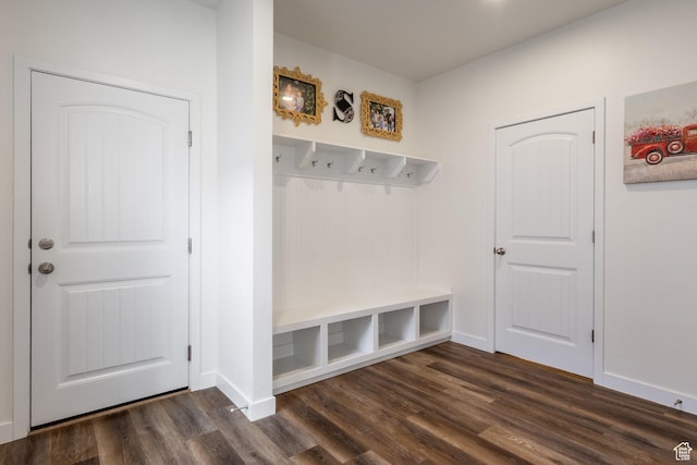 6321 W Moon Valley Dr, South Jordan, UT 84009 - mudroom featuring baseboards and dark wood-style floors