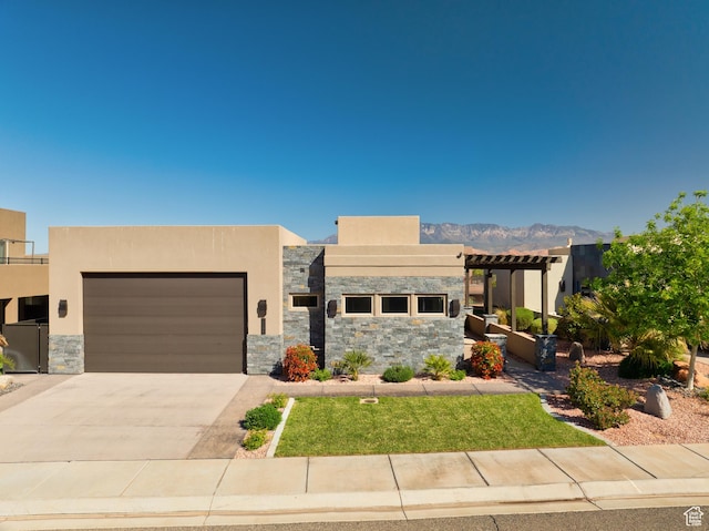 5024 W Nashoba Trl Unit 74, Hurricane, UT 84737 - contemporary house with stone siding, stucco siding, and an attached garage