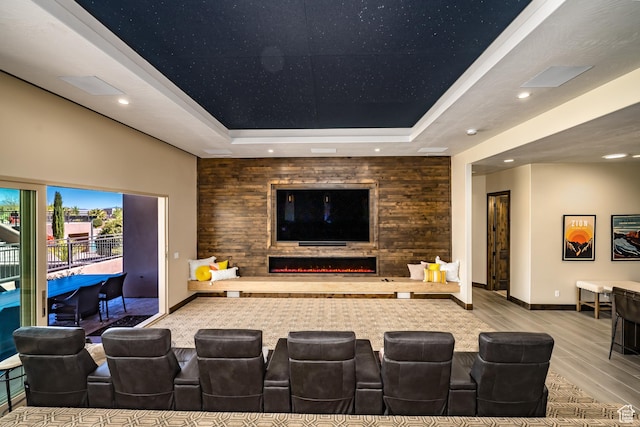5024 W Nashoba Trl Unit 74, Hurricane, UT 84737 - cinema with a tray ceiling, recessed lighting, a lit fireplace, and wood finished floors