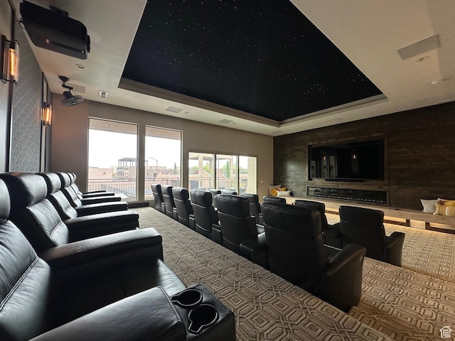 5024 W Nashoba Trl Unit 74, Hurricane, UT 84737 - carpeted home theater room featuring a tray ceiling and visible vents