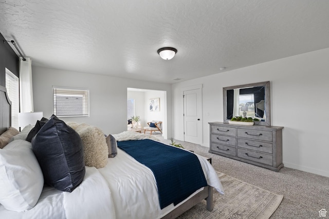 988 E Harrier St N, Eagle Mountain, UT 84005 - bedroom with baseboards, carpet floors, and a textured ceiling