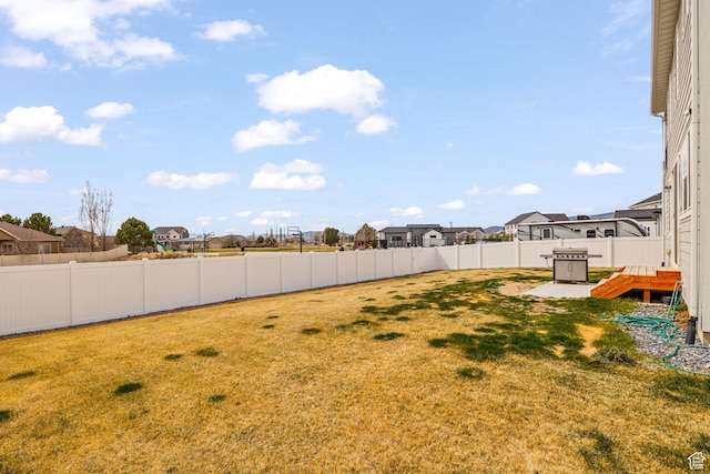 988 E Harrier St N, Eagle Mountain, UT 84005 - view of yard featuring a fenced backyard and a residential view