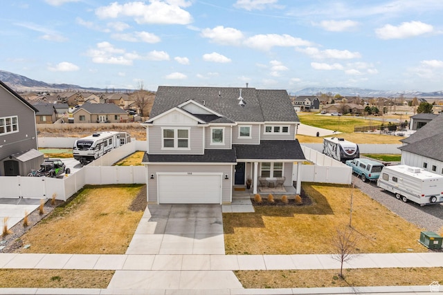 988 E Harrier St N, Eagle Mountain, UT 84005 - traditional-style home featuring fence, a front yard, a residential view, driveway, and a porch