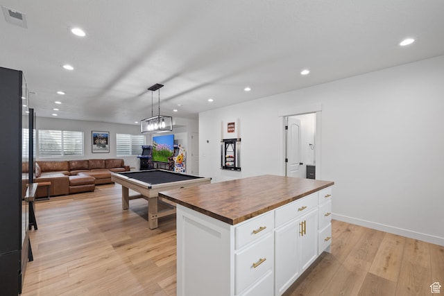 988 E Harrier St N, Eagle Mountain, UT 84005 - kitchen with open floor plan, white cabinetry, wood counters, light wood-style floors, and visible vents