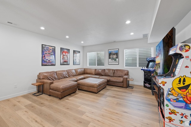 988 E Harrier St N, Eagle Mountain, UT 84005 - living room with baseboards, visible vents, recessed lighting, and light wood-type flooring