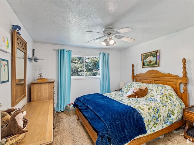 850 W 370 S, Logan, UT 84321 - bedroom featuring light carpet, a textured ceiling, and ceiling fan