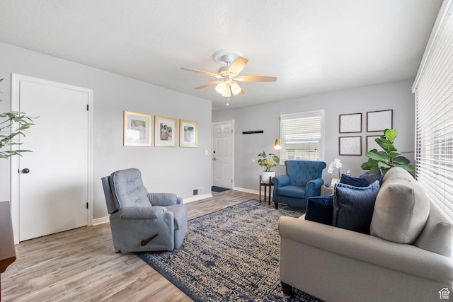 510 S Grant E, Ogden, UT 84404 - living room featuring plenty of natural light, baseboards, light wood-style floors, and ceiling fan