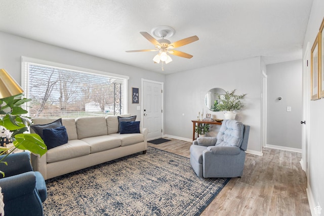 510 S Grant E, Ogden, UT 84404 - living area with baseboards, a textured ceiling, ceiling fan, and wood finished floors