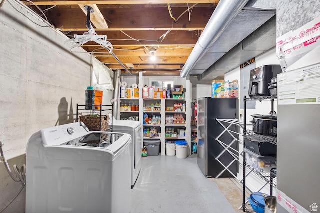 510 S Grant E, Ogden, UT 84404 - unfinished below grade area with washer and dryer and freestanding refrigerator