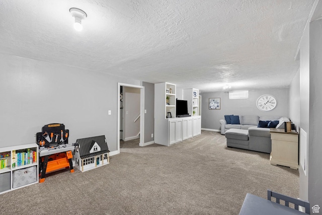 510 S Grant E, Ogden, UT 84404 - carpeted living area featuring baseboards and a textured ceiling
