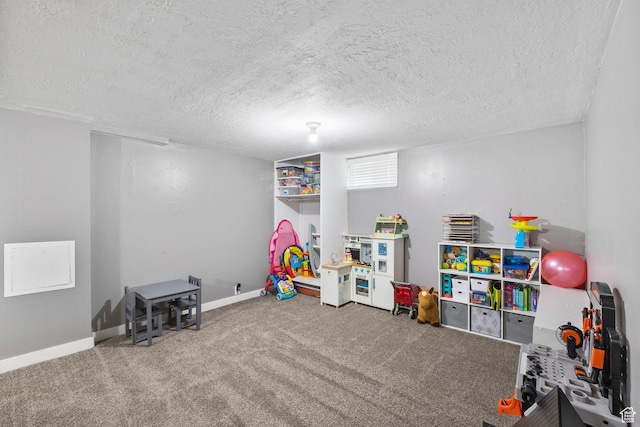 510 S Grant E, Ogden, UT 84404 - playroom featuring carpet floors, baseboards, and a textured ceiling