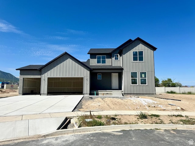 1002 E 250th St S Unit 17, Salem, UT 84653 - modern inspired farmhouse featuring board and batten siding, an attached garage, and concrete driveway