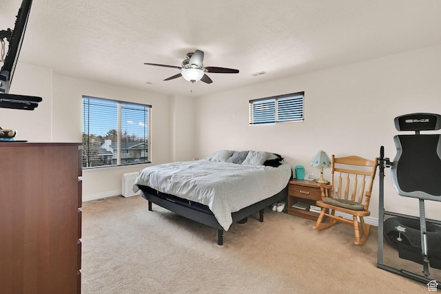 6007 W Jargon Way, Salt Lake City, UT 84118 - bedroom with baseboards, a textured ceiling, ceiling fan, visible vents, and light carpet