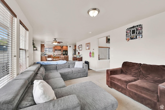 6007 W Jargon Way, Salt Lake City, UT 84118 - living room with a ceiling fan, light carpet, and baseboards