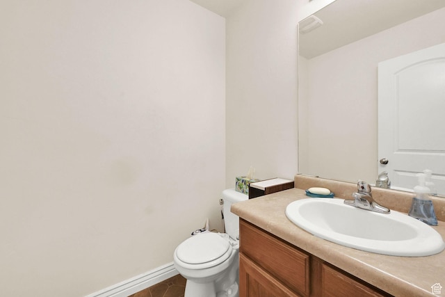 6007 W Jargon Way, Salt Lake City, UT 84118 - bathroom with toilet, vanity, baseboards, and tile patterned flooring